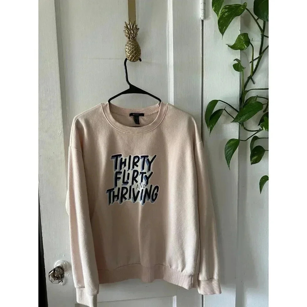 Forever21 Womenβs size Medium Thirty Flirty & Thriving sweater